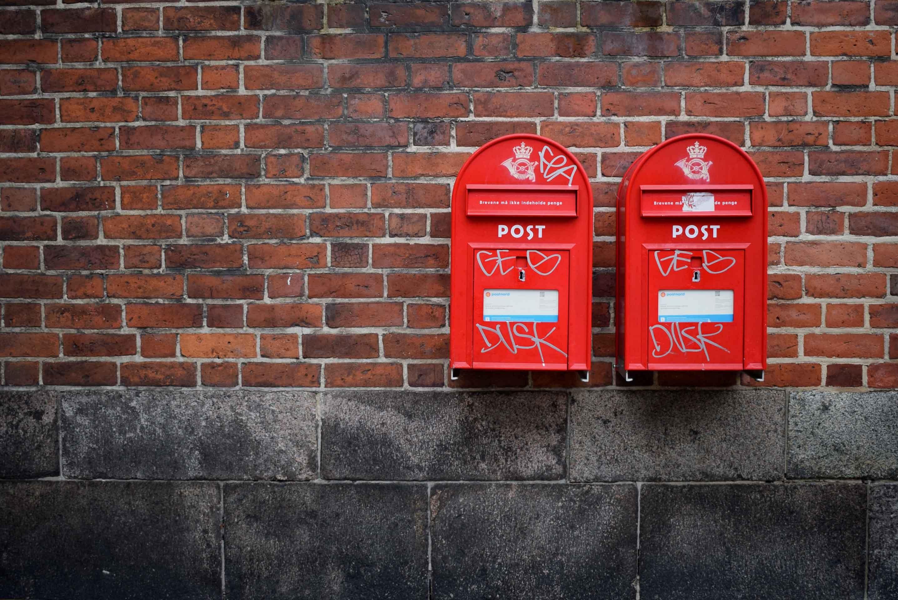 Danish mailboxes on a wall